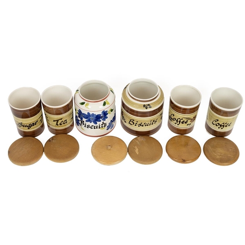 70 - Toni Raymond Pottery - a collection of 6 storage jars with beechwood lids for coffee, tea, biscuits ... 