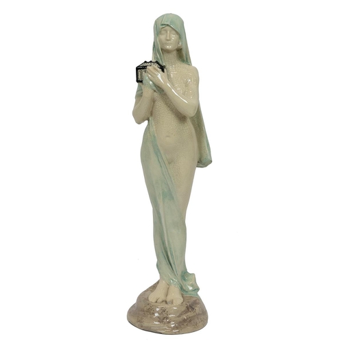 85 - After Maurice Bouval (French, 1863-1916) - Le Secret - an Art Nouveau glazed ceramic figure of a sem... 