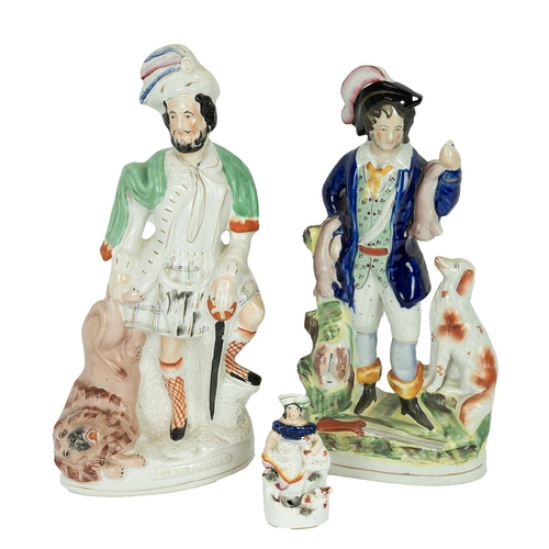 95 - Two large 19th Century Staffordshire flatback figures of hunters - one with game and hound (41cm), t... 