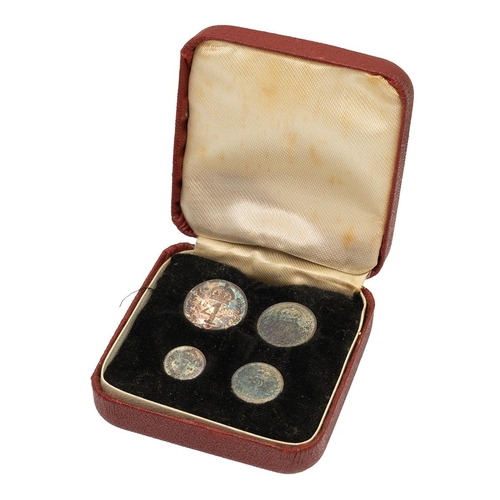 238 - 1896 Queen Victoria Widowed Head Maundy Money four-coin set with blue toning in a presentation box. ... 