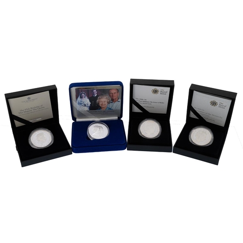 309 - Four (4) silver proof £5 Crown coins from The Royal Mint in their original presentation boxes. Inclu... 