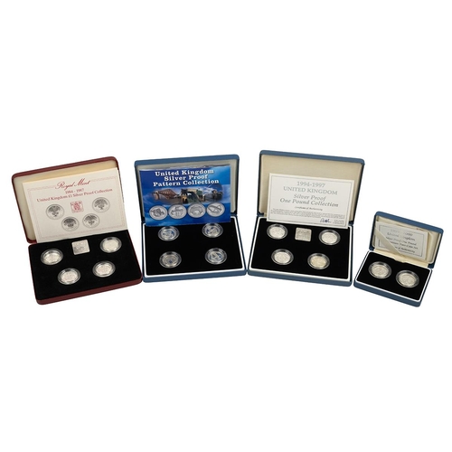 317 - Four (4) silver proof Royal Mint £1 coin collectors sets. Includes (1) 1984-1987 National flowers 4-... 