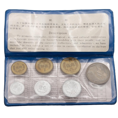 346 - 1980 scarce People's Bank Of China uncirculated seven-coin set in blue folder. Includes (1) 1980 1 F... 