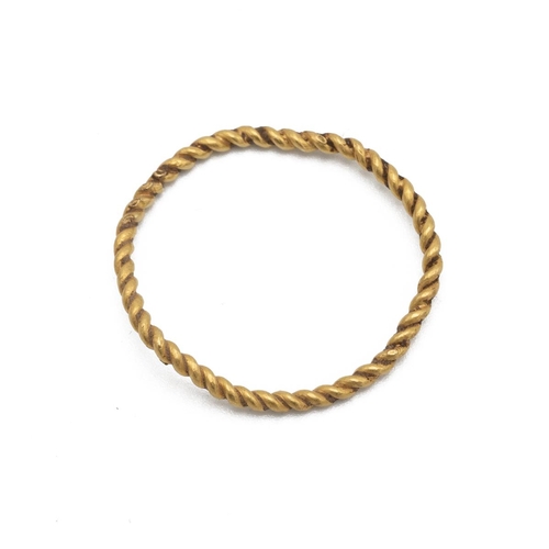 448 - Delicate gold rope twist ring, for a woman or child, likely 16th or 17th century. Around size K. Rec... 