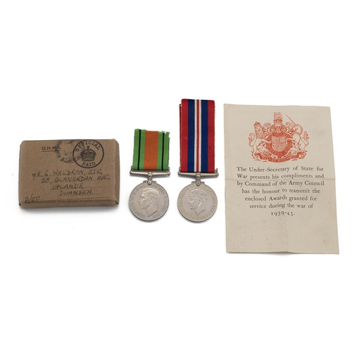 801 - Medals (2) of G. Waldron. Sold with Army Council printed slip and box. Defence Medal 1939-1945, and ... 