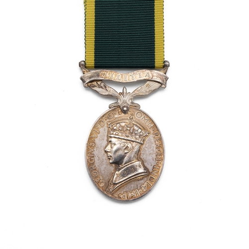 834 - GV Efficiency Medal with clasp 'Militia' of 2324682 Serjeant W.M. NcNeill of the Royal Signals.