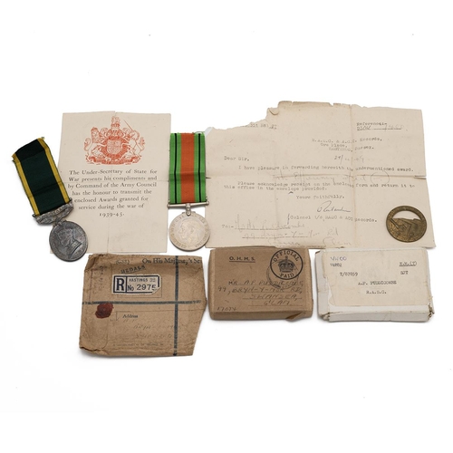 835 - Medals (2) of T-87859 Serjeant A.P. Puddicombe R.A.S.C. (T.A.). Sold with boxes and a commemorative ... 