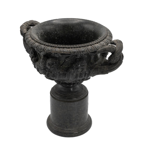 106 - Grand Tour 18th/19th Century Warwick Vase in black marble. Height 24cm, maximum width 25cm. The Warw... 