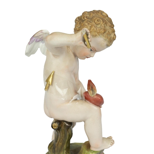 114 - Meissen - two 19th century cupids, one piercing a heart with an arrow (broken) (20cm) and the other ... 