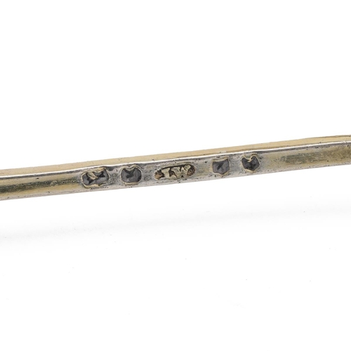 121 - 19th century silver gilt cayenne pepper spoon fitted with a facetted glass terminal. L 11.5cm.