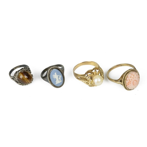 2 - 9ct gold ring, with a carved shell, along with an unmarked 9ct gold ring with a single pearl, 9.10 g... 