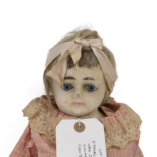 206 - Mid 19th Century 23 inch unmarked doll. Wax face and china legs/hands. Period clothing. 