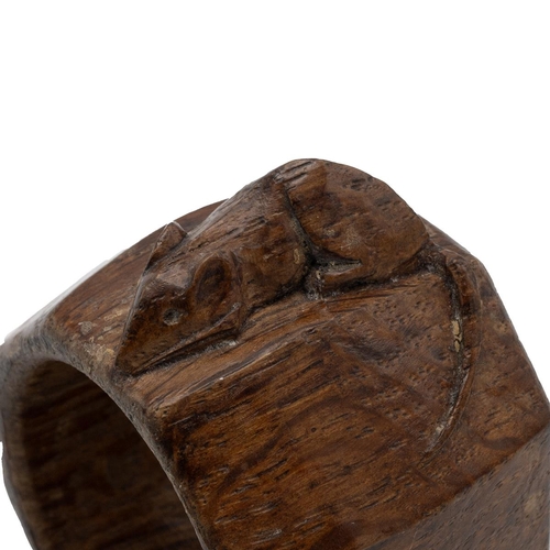 245 - Robert Thompson, Mouseman of Kilburn, an octagonal napkin ring with a carved mouse signature, L5cm.