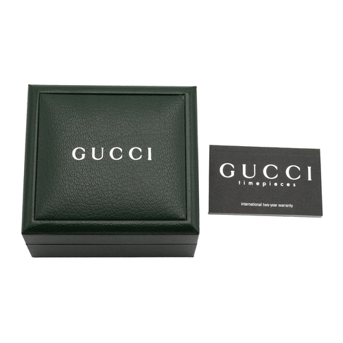 25 - Gucci change bezel gold plated wrist watch with white dial, model 1100L in green leather box, with 1... 