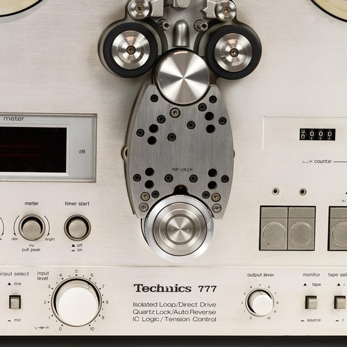 257 - Audio Interest. Vintage Technics RS-777 reel to reel tape player. Isolated loop, direct drive, quart... 