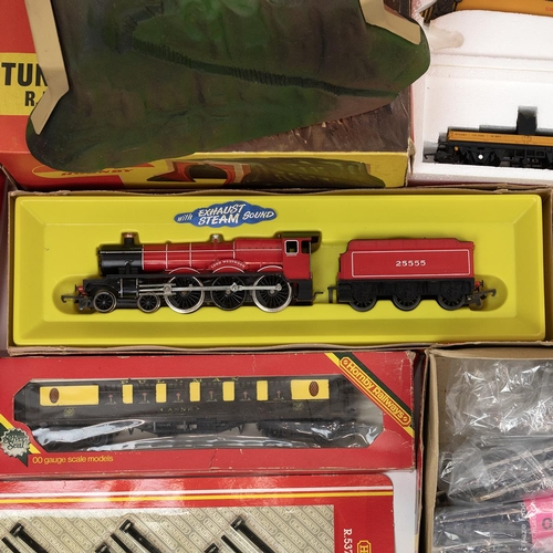 275 - Quantity of mainly boxed Hornby 00 gauge railway trains and stock. To include R.782 Smokey Joe loco,... 