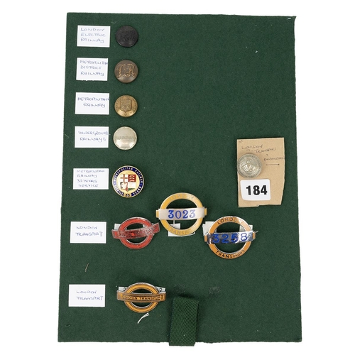 280 - Group of London railway badges and buttons including Metropolitan 35 year service badge. London elec... 