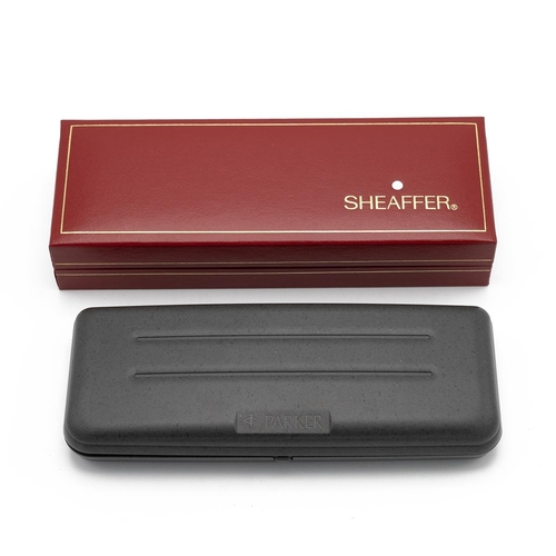 320 - Sheaffer white dot gold plated fountain pen in a red leather presentation box together with a Parker... 