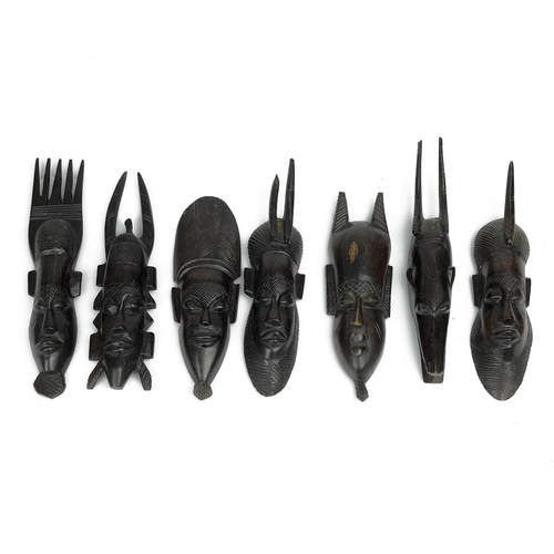 333 - Collection of ebony figurines and a hand loom or heddle, all from Central or West Africa. (9)