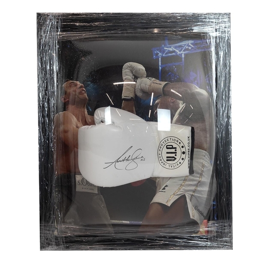 336 - Anthony Joshua - heavyweight boxing champion - A signed white boxing glove with a certificate of aut... 