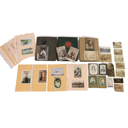 364 - A collection of 20th century postcards, mostly valentines and birthdays contained in three albums, a... 