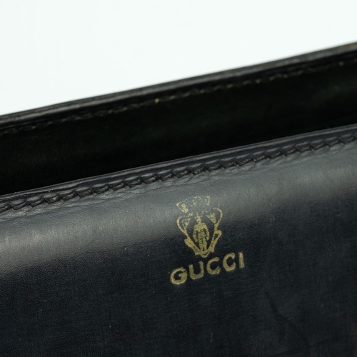 368 - Circa 1980s vintage Gucci black leather handbag, with gold-tone hardware, single handle, leather int... 