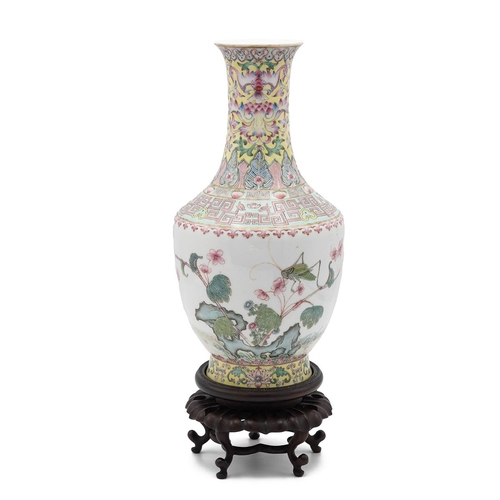 380 - A Chinese Republic Period (1911-1949) baluster shaped famille rose vase on wooden stand, decorated w... 