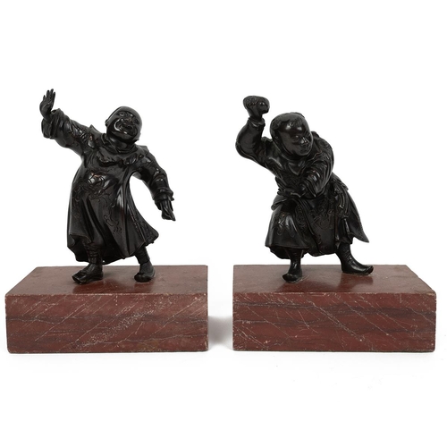 382 - Two late 19th/early 20th century Japanese Meiji era bronzes of Chinese boys, one holding a stone and... 