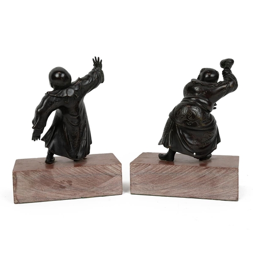 382 - Two late 19th/early 20th century Japanese Meiji era bronzes of Chinese boys, one holding a stone and... 