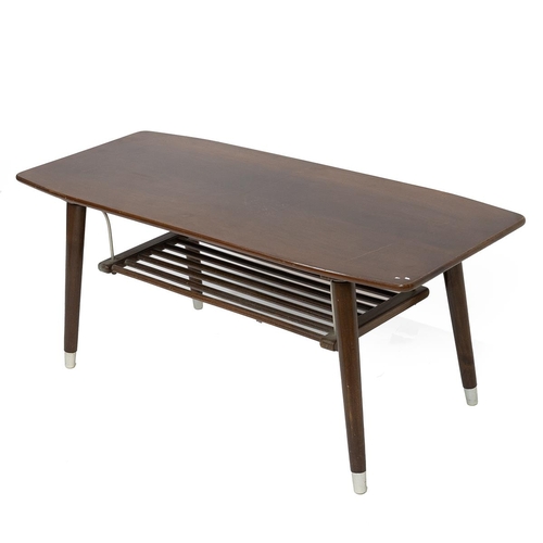 406 - Mid Century stained beech coffee table with magazine rack below raised on atomic legs. No maker labe... 