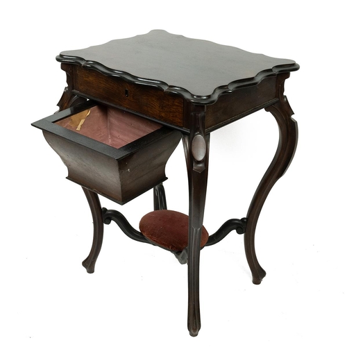 410 - Edwardian rosewood sewing table with sliding top opening to reveal a drawer fitted with boxwood comp... 