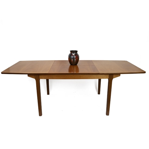 411 - Mid century Nathan beech wood extending dining table and four chairs with three additional chairs. H... 