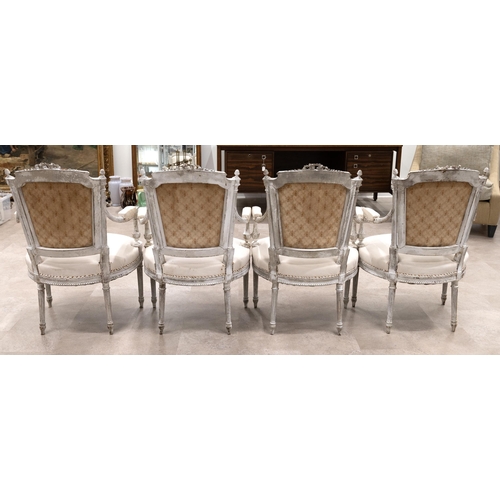 413 - Set of four French 19th century Louis XVI style armchairs. Carved wood frames with ribbon detail to ... 