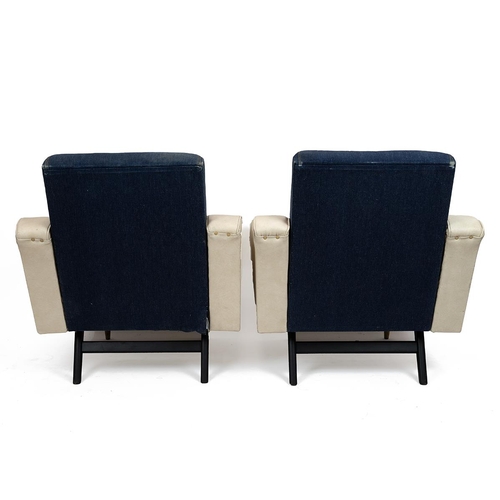 414 - A pair of 1950's lounge armchairs with original leatherette arms and base, the backs having been reu... 