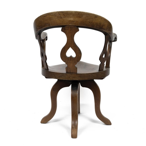 418 - Mid Victorian elm and beech swivel office chair with slatted back the lyre shaped slats pierced with... 