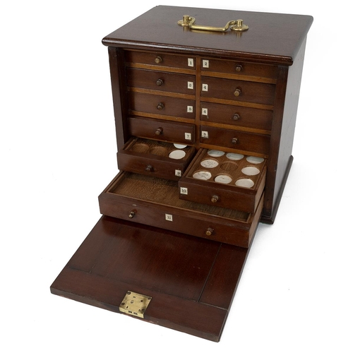 421 - Early 20th Century mahogany coin collector's cabinet with brass carrying handle and hinged door to f... 