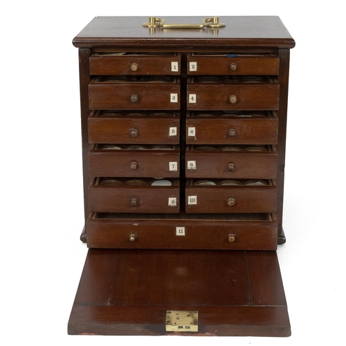 421 - Early 20th Century mahogany coin collector's cabinet with brass carrying handle and hinged door to f... 