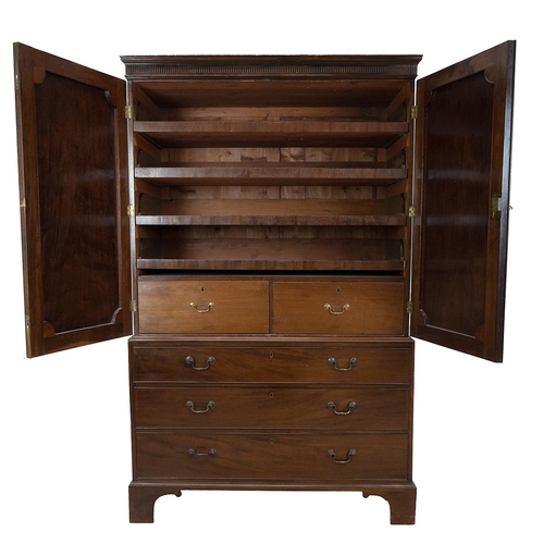 424 - Georgian flame mahogany linen press, three drawers, with swan neck brass handles below cabinet with ... 