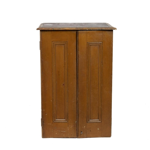 427 - Early 20th Century pine haberdasher's cabinet with lockable panel doors opening to reveal 18 drawers... 