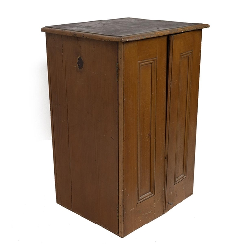 427 - Early 20th Century pine haberdasher's cabinet with lockable panel doors opening to reveal 18 drawers... 