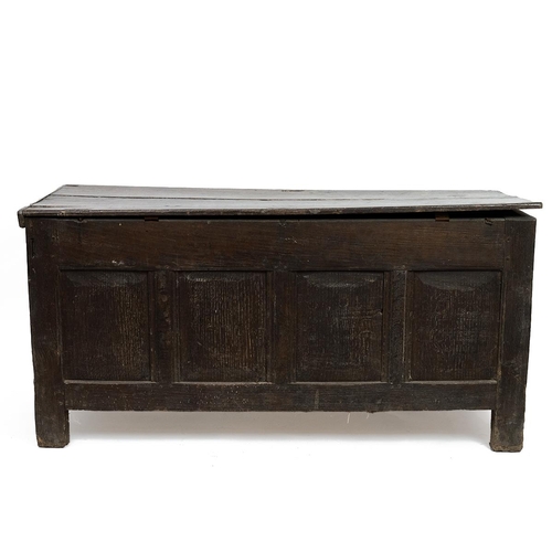 432 - Late 17th or early 18th Century oak coffer with four geometric carved panels to front, the  two plan... 