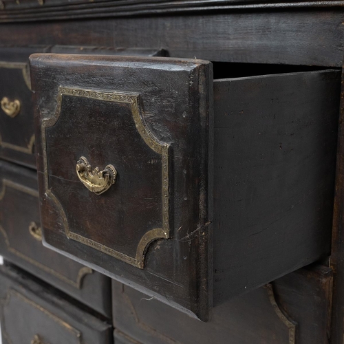 435 - Anglo-Indian small hardwood chest of drawers with extensive brass detailing. Three small drawers wit... 