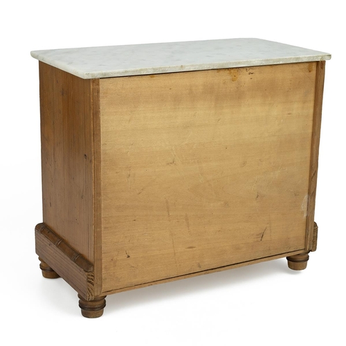 436 - An early 20th-century burr maple veneer apprentice chest of drawers, with a white marble top, faux b... 