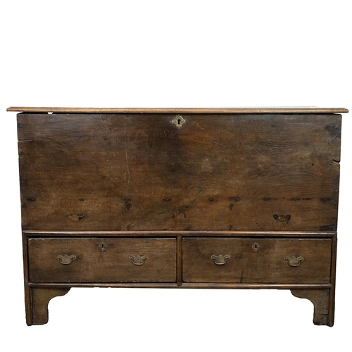 439 - Early 19th Century Oak and Elm Mule Chest the hinged top opening to reveal candle box, two drawers w... 