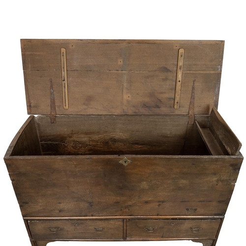 439 - Early 19th Century Oak and Elm Mule Chest the hinged top opening to reveal candle box, two drawers w... 