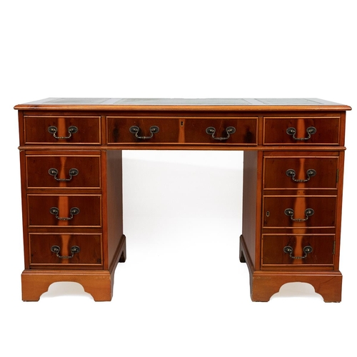 441 - Late 20th Century yew wood twin pedestal desk with tooled green leather top over six drawers and a c... 