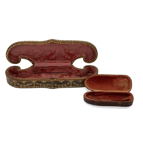 5 - A 19th-century tooled leather-shaped jewellery case, with a red fabric interior, and another leather... 