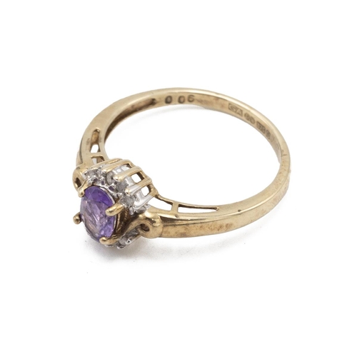 53 - 9ct gold ring, set with central amethyst, surrounded by 10 moissanite set stones. Size N1/2.