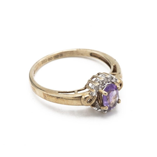 53 - 9ct gold ring, set with central amethyst, surrounded by 10 moissanite set stones. Size N1/2.