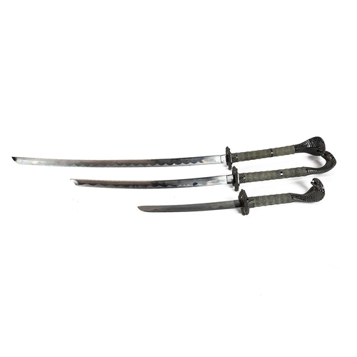 73 - Set of three decorative Katana (ranging in length from 108cm to 60cm in length including the scabbar... 